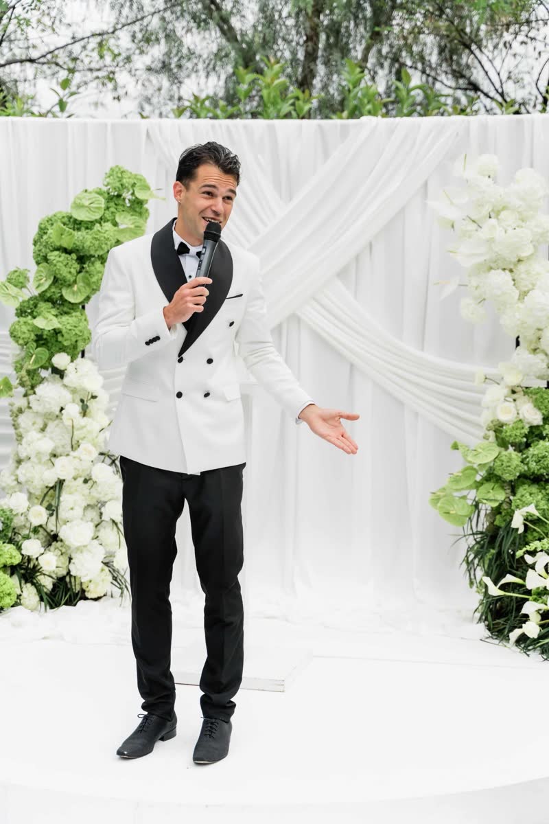 Vova leading Nuray and Adam's ceremony as their celebrant